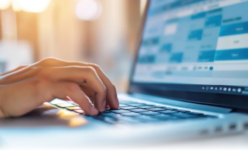 Person typing on a laptop