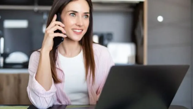 A woman talking to someone on her phone