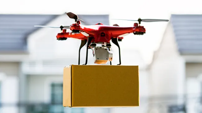 Drone carrying a parcel