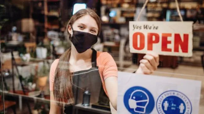 A store staff saying the store is open