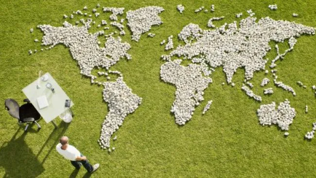 A world map made out of golf balls