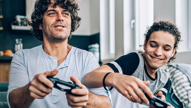Two friends playing a video game