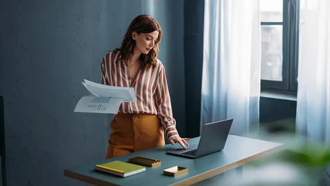 Woman working at her desk