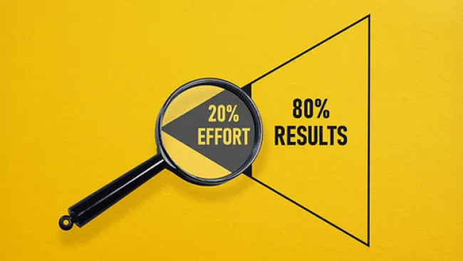 Image of a magnifying glass with the text "20% efforts, 80% results"