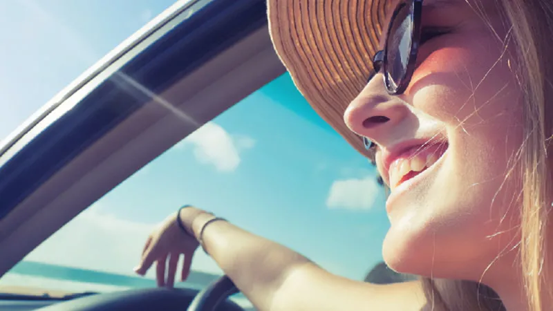 Woman driving in her car