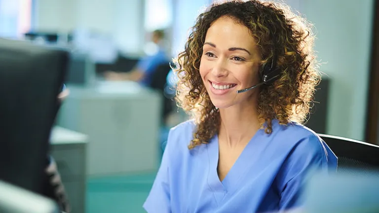 Healthcare associate wearing a headset